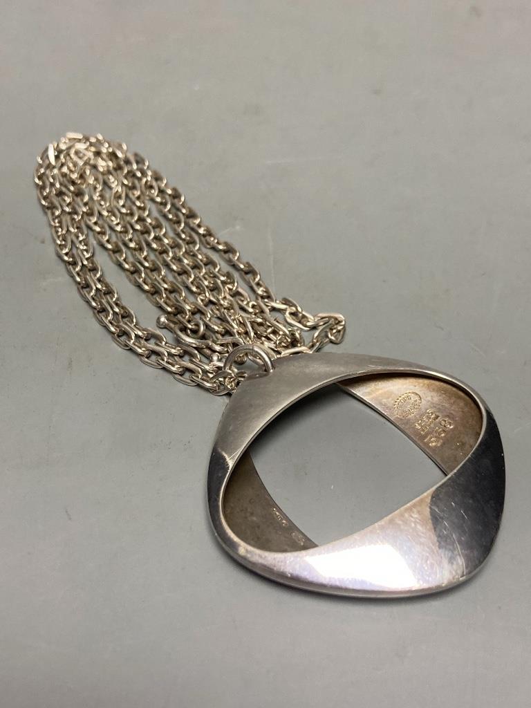 A 1970's Georg Jensen 925S openwork pendant necklace, design no. 368, pendant 45mm, chain, 72cm.